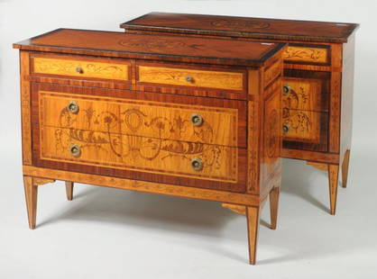 Pair Italian Neoclassical Style Marquetry Commodes: Pair of Italian neoclassical style marquetry commodes, each with a rectangular cross-banded top centering a floral medallion, over a case of two short over two long foliate marquetry drawers. 44" wide