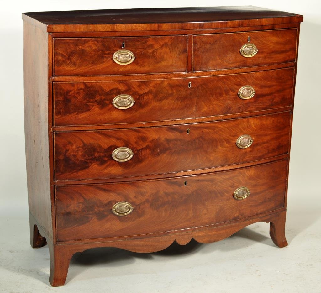 George III Inlaid Mahogany Swell Front Chest: Georgian inlaid mahogany swell front chest, England, late 18th century, with cross banded top above two small and three graduated long drawers, set on flaring later French feet with shaped apron. 42 1