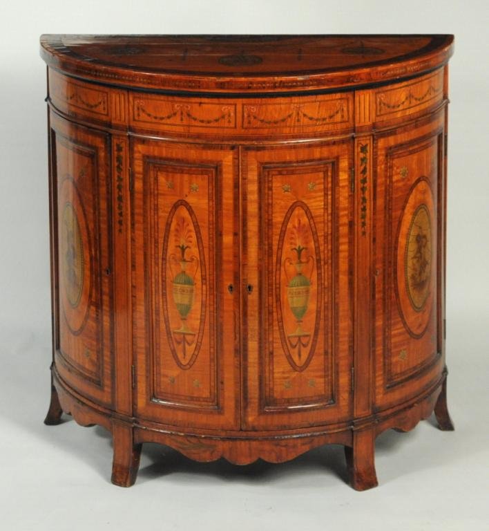 Edwardian Decorated Satinwood Demilune Cabinet: Edwardian satinwood painted demilune side cabinet, circa 1905, with classical decoration, left door top stamped H. Samuel, 484 Oxford St, D shaped top above a pair of cabinet doors flanked by side cab