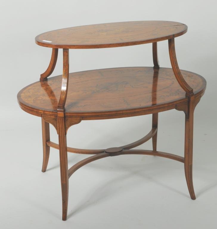 Edwardian Style Inlaid Satinwood Oval Etagere: Edwardian style inlaid satinwood two tier oval etagere decorated with foliate garlands and musical instruments. 31" high, 35" wide, 21 1/2" deep.