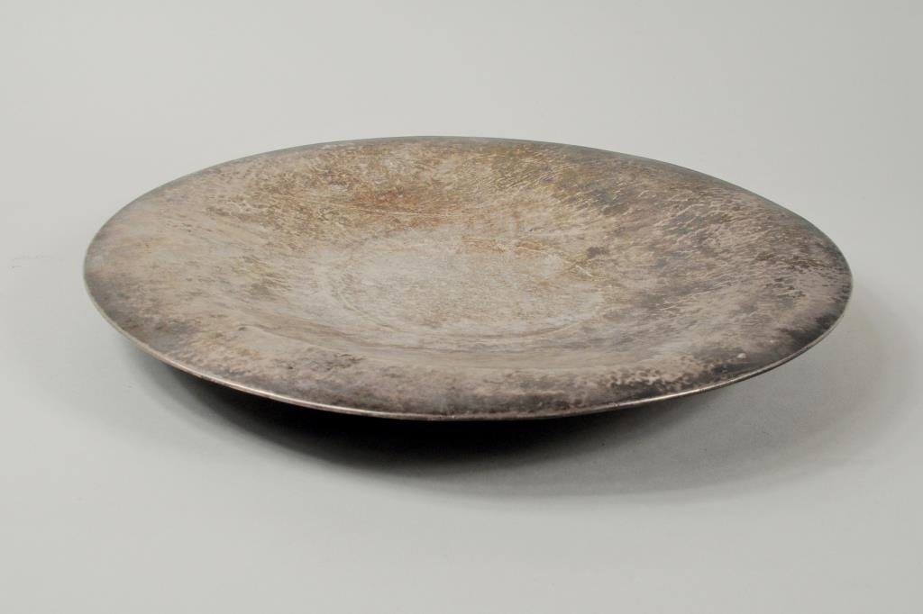 Clemens Friedell Sterling Silver Footed Tray: Clemens Friedell hand hammered sterling silver footed tray, 20th century. 1 1/4" high, 11" diameter. Weight: 16.810 OZT. Condition: light scratches, ding.