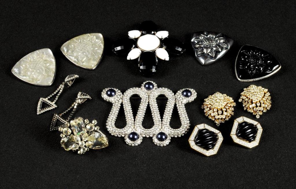 Eleven Karl Lagerfeld, Escada Costume Jewelry: Eleven costume jewelry items comprising Lagerfeld, Escada, Landau, Alex and Ami and others. 1" wide, 1 1/2" long to 3 1/4" wide, 4" long.