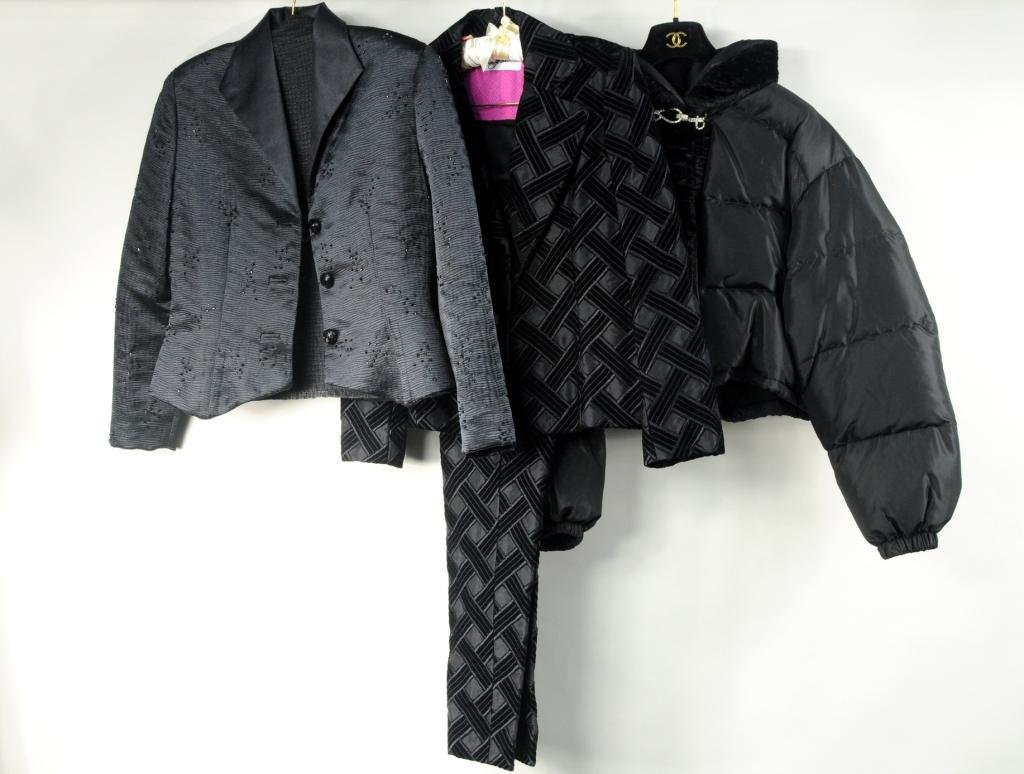 Three Ladies Evening Wear Articles: Three ladies evening wear articles comprising a Shahin velvet pants suit, a Blumarine down jacket with rhinestone closure, and a Flores black satin jacket and blouse. Size: small.