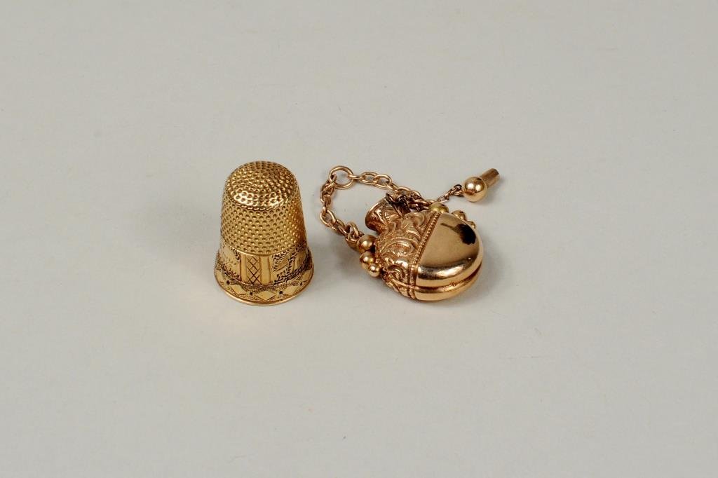 14K Gold Perfume Pendant & Thimble: 14K gold perfume pendant and thimble, 19th century. 3/4" high, 5/8" diameter to 7/8" wide, 1 1/2" high, thimble size 7. Weight 5.6 DWT.