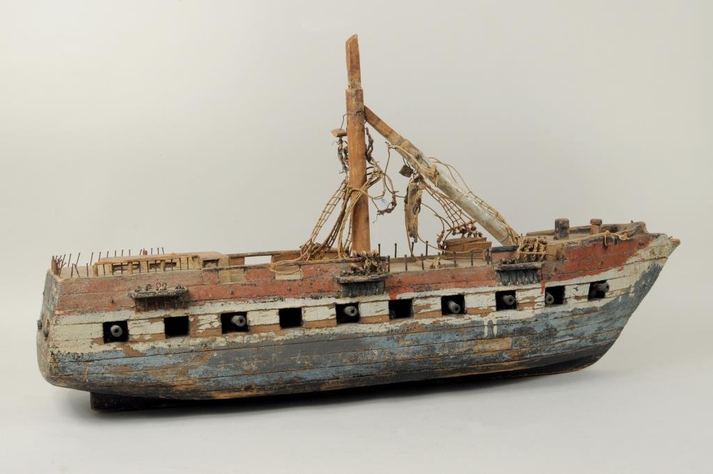 Folk Art Carved & Painted Ship Model: Folk Art carved and painted ship model, 14 1/2" high, 27" long.