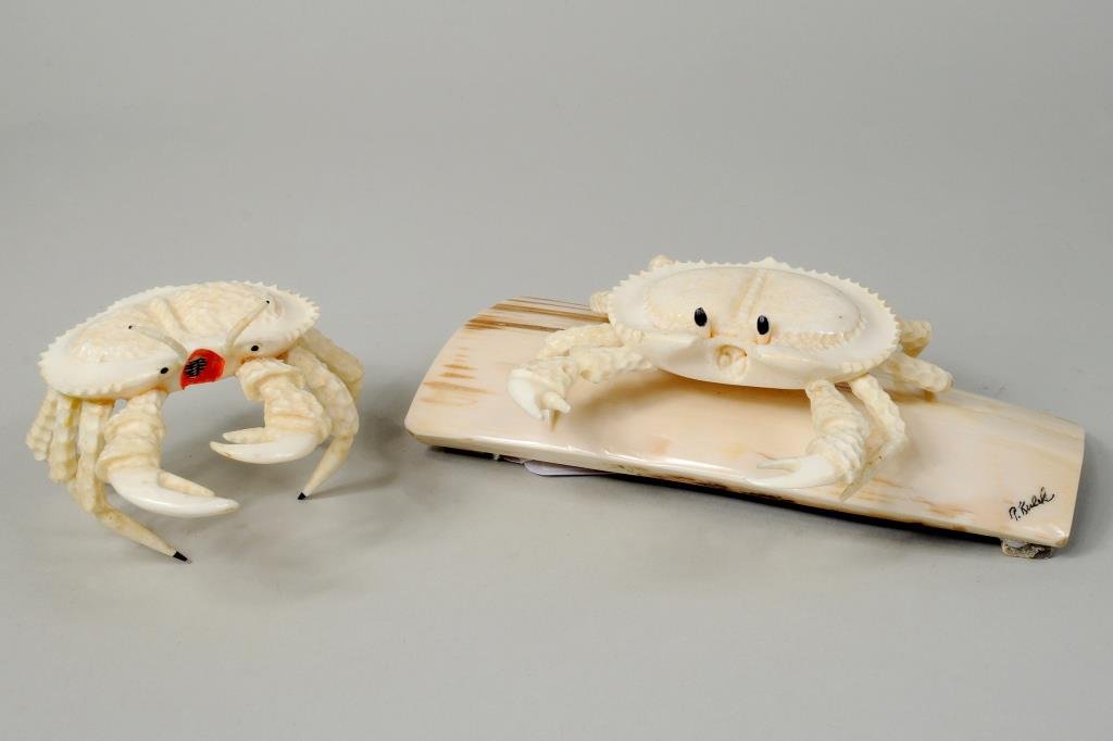 Two Signed Inuit Animal Carvings: Two signed Inuit animal carvings comprising a walrus and two marine ivory Alaskan crabs, one signed, dated "Paul Kulik '74", other signed "R? Kulik". 2 3/4" high, 3 1/2" wide to 2 1/4" high, 7" long.