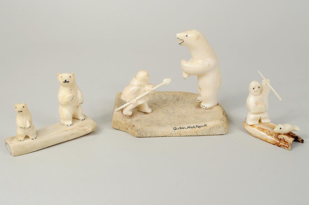Three Inuit Walrus Ivory & Whalebone Carvings: Three Inuit walrus ivory and whalebone carvings of hunters and bears, the largest signed "Gabe Muktoyuk", bears signed "RKS Wales, Alaska", smallest signed "JK Saclamana King Island AK". 2 1/4" high, 