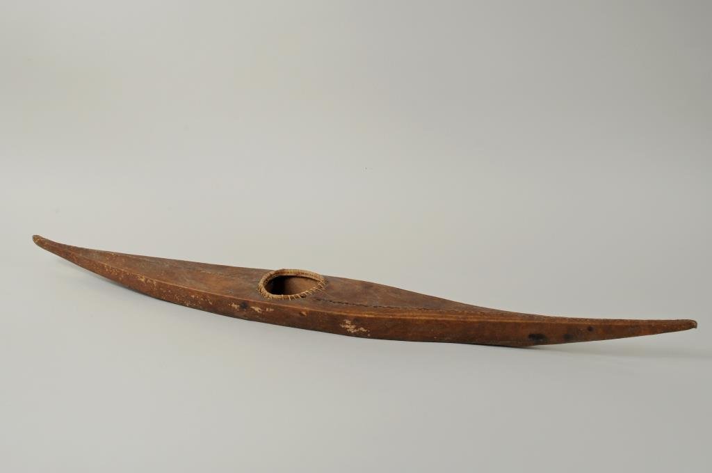 Vintage Inuit Sealskin Kayak: Vintage Inuit sealskin kayak. 28 1/2" long, 3 1/4" wide.
