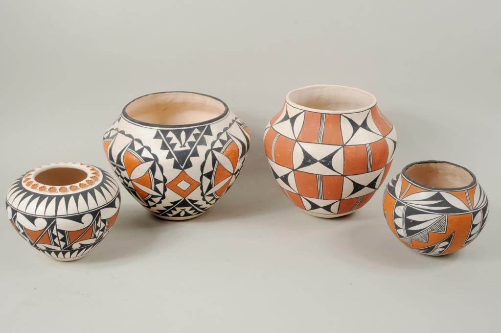 Four Vintage Acoma Pots: Four vintage Acoma pots, largest signed on base "Pueblo of Acoma", next largest "A. Leon Acoma", next "J. or I. Chino '83" and "Frances Concho". 4 1/4" high, 5 1/4" diameter to 6" high, 7 1/2" diamete