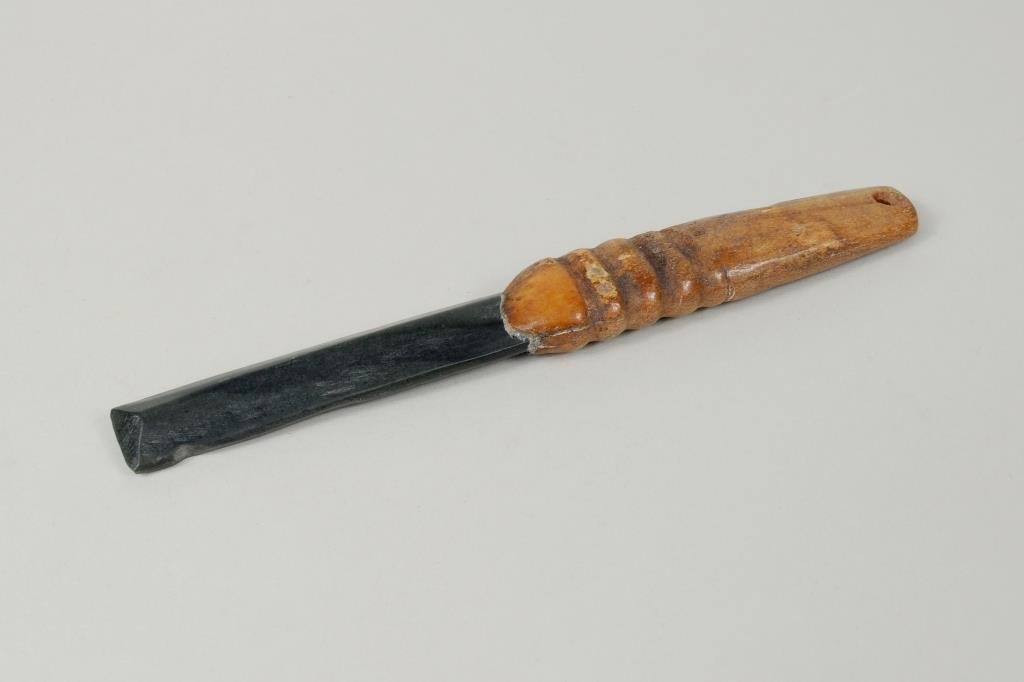 Inuit Hide Scraper with Fossil Ivory Handle: Inuit hide scraper with fossil ivory handle and stone blade. 6 1/4" long, 7/8" wide.