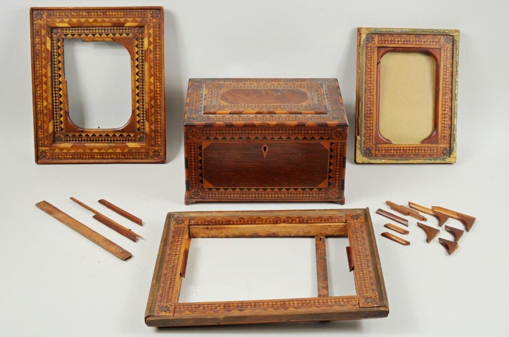 Inlaid POW Box and Three POW Frames: An inlaid prisoner of war box and three prisoner of war frames, all with eight pointed star decoration. Box 9" wide, 6" long. Frames 8 1/2" high, 6 1/2" wide to 11 1/4" high, 9 1/4" wide.