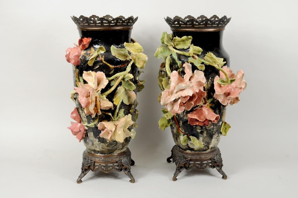 Pair Faience Pottery Vases, Poss. Edouard GIlles: Pair of Continental majolica or faience pottery vases with applied floral decoration, fitted with gilt metal mounts, stamped 234 and "P" on base, possibly Edouard Gilles. 18" high, 10" wide. Condition