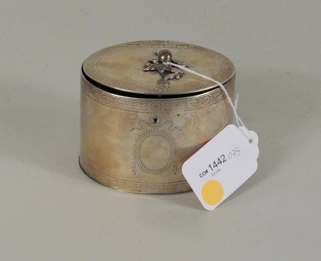 George III Sterling Silver Tea Caddy: George III sterling silver tea caddy made in 1796, makers' mark WV. 4 1/4" high, 4 1/2" wide. Weight: 10.370 OZT. Condition: scratches, a couple dings, repairs, missing one screw and washer from finia