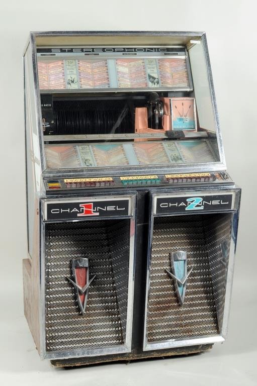 Seeburg Jukebox Model 222: Seeburg jukebox, Model 222, 'Channel 1, Channel 2 Stereophonic Selectomatic' with illuminated grill. This was the first stereo jukebox and plays eighty 45 RPM records. 56" high, 32 1/2" wide, 27 1/4"