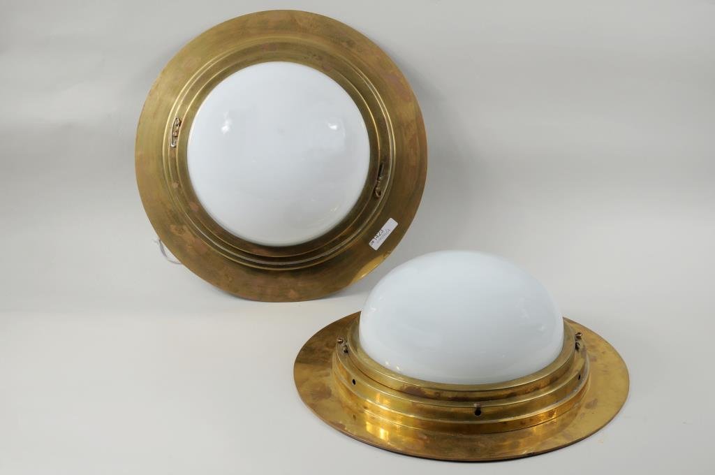Pair Heavy Brass & Glass Lighting Fixtures: Pair of heavy brass and glass lighting fixtures with stepped round frame and milk glass dome shades. 6" high, 14 1/2" diameter. Condition: both hinge pins loose on one, other lacking one hinge pin, fi