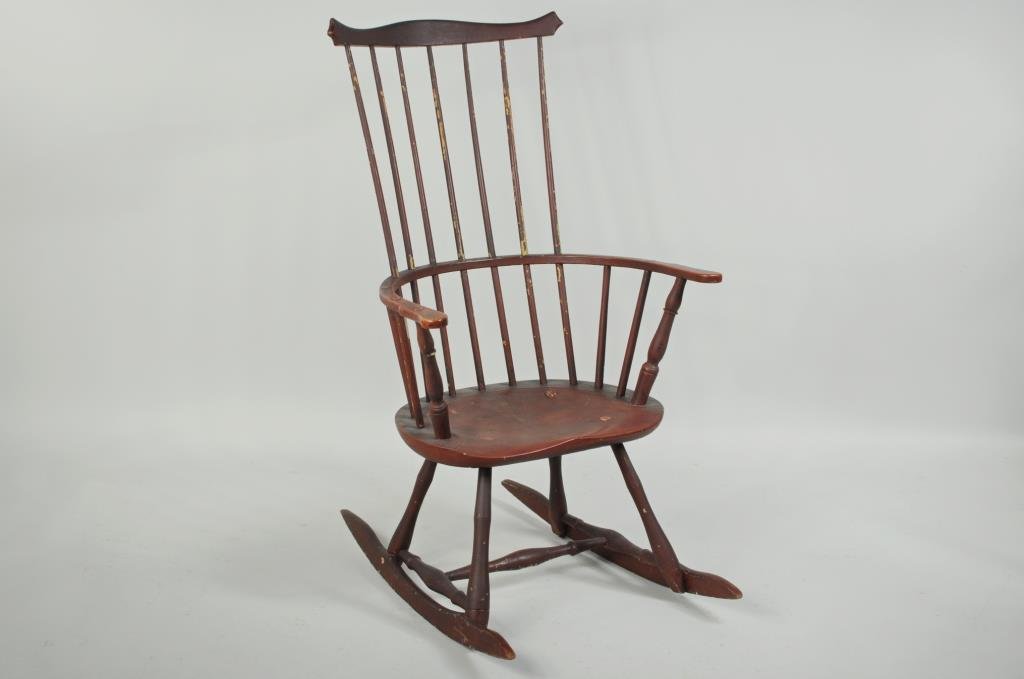 Windsor Painted Comb Back Rocking Chair: Windsor painted comb back rocking chair, having serpentine crest with notched ears, shaped hand holds and bamboo turned legs. 41" high, 23 1/2" wide, 29" deep. Condition: wear to painted surface, cent