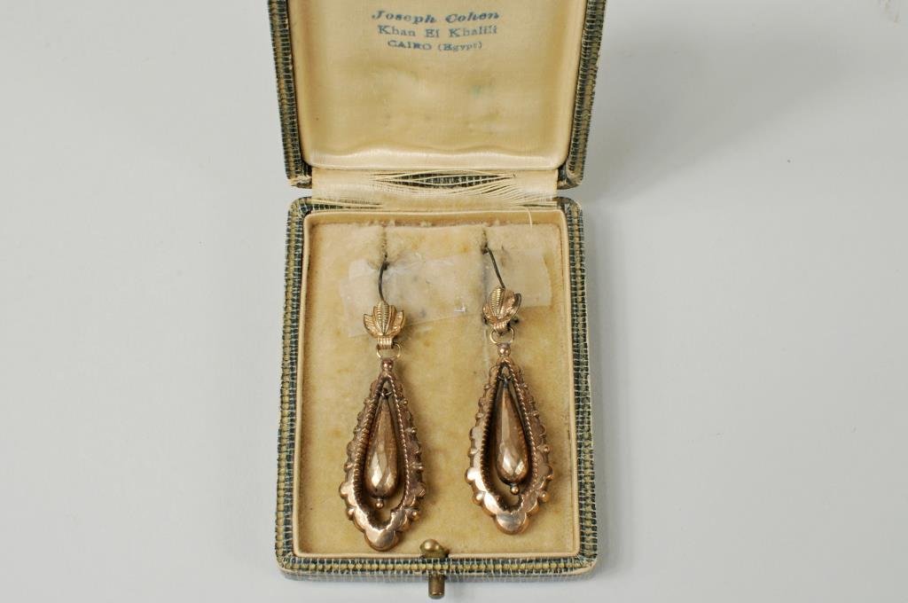 Victorian Gold Earrings, Original Joseph Cohen Box: Pair of Victorian gold earrings in original box labeled "Joseph Cohen, Khan El Khalili, Cairo, Egypt". 1 1/4" long, 3/4" wide. Condition: a few small dents.