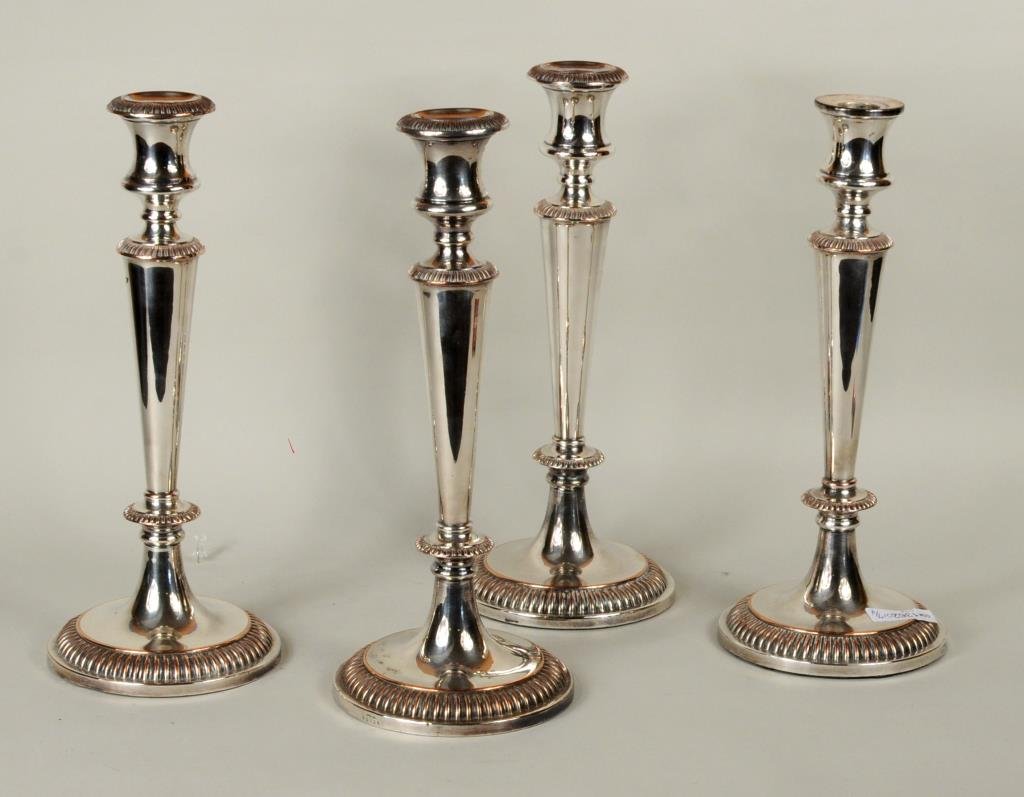 Set Four Old Sheffield Candlesticks, Bolton: Set of four Old Sheffield silver plated candlesticks, manner of Matthew Bolton. 13" high, 5" diameter. Condition: plate wear, loss; one candlestick lacking bobeche, a few small dings.