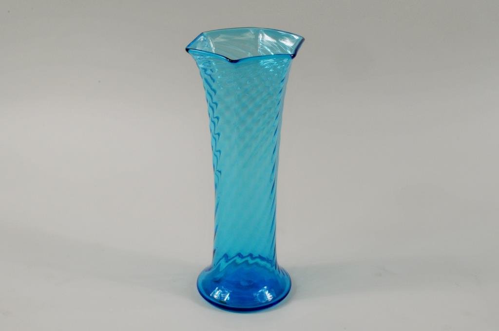 Steuben Blue Ribbed Glass Vase, Signed: Steuben blue ribbed glass vase, signed with acid etched fleur de lis mark. 8" high, 3 1/2" wide. Condition: light base scratches.