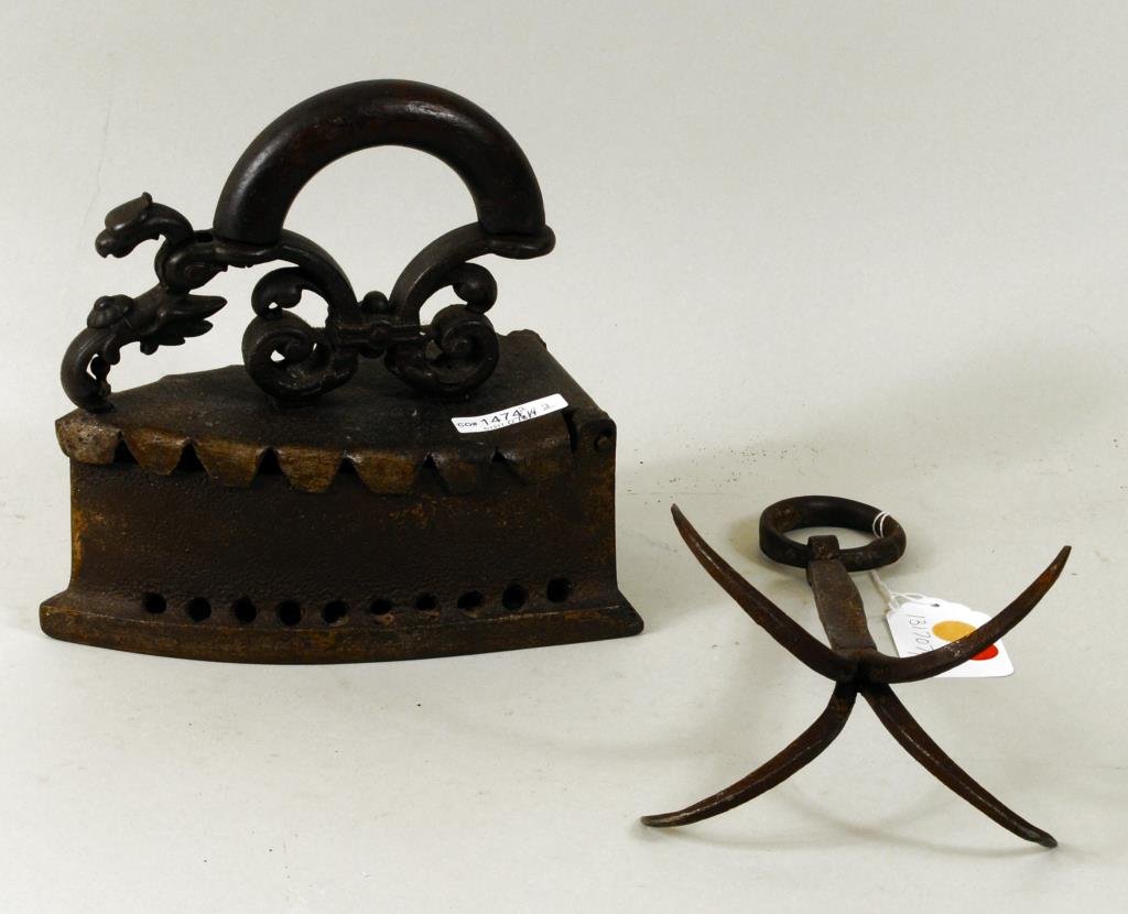 Cast Iron Sadiron & Wrought Iron Hook: A cast iron sadiron and a wrought iron hook. 9 1/2" high, 6" wide to 9" high, 9 1/4" wide. Condition: rust, pitting, dent to iron lid.