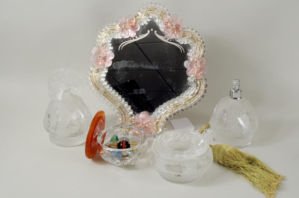 Group Glass Tabletop Items: Group of glass tabletop items comprising a Venetian vanity mirror, three Verlys dressing table articles and a Bakelite covered jar. 2 3/4" high, 5" diameter to 11 1/2" high, 10 1/2" wide. Condition: c