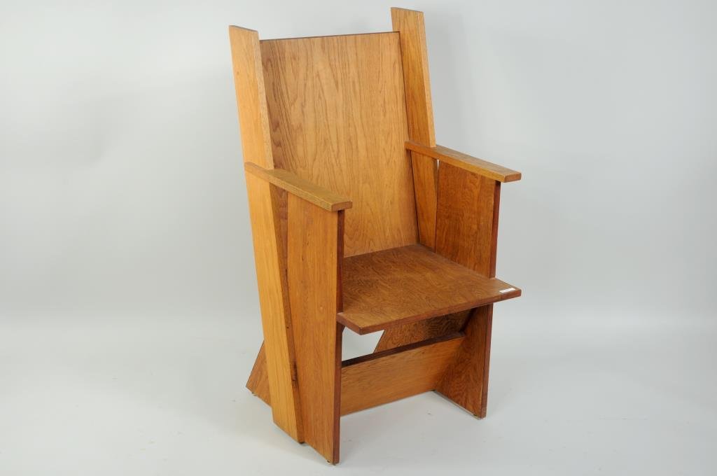 Frank Lloyd Wright Style Arm Chair: Frank Lloyd Wright style arm chair, with paneled back and sides. 40 1/2" high, 22" wide, 24" deep.