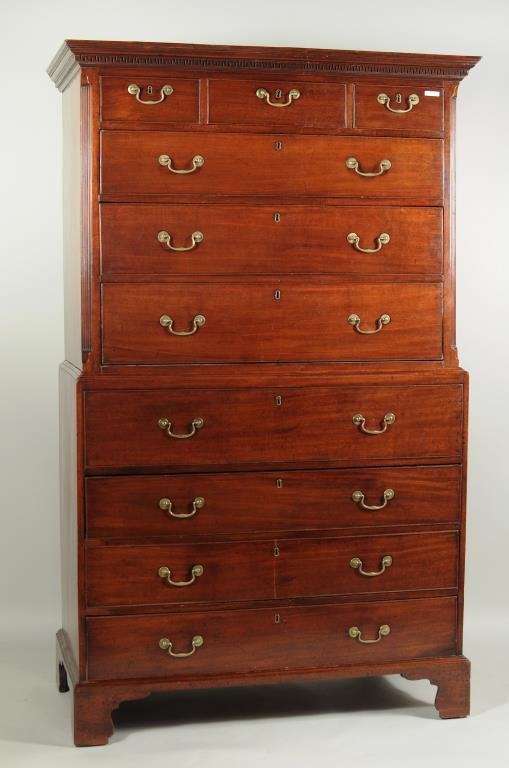 George III Mahogany Chest on Chest: George III mahogany chest on chest, top with molded cornice above three short drawers over three graduated drawers, case with drop front desk surface with open cubbies flanked by three drawers and dra