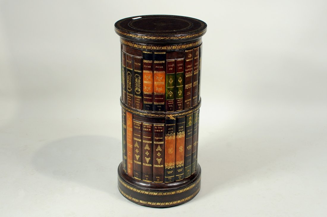 Maitland Smith Book Form Stand: Maitland Smith book form stand, one interior shelf. 28" high, 14" diameter. Condition: light surface soiling.