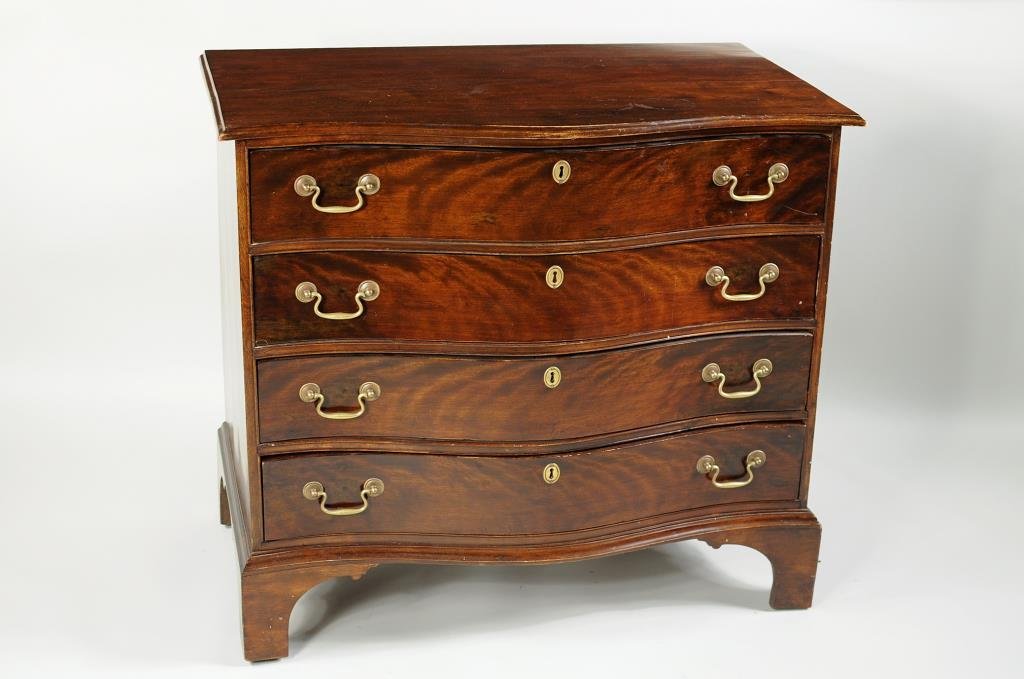 Fine Chippendale Birch Serpentine Chest: Fine Chippendale wavy birch serpentine chest of drawers, the molded rectangular top with serpentine front over a conforming case of four drawers with applied beaded surrounds, on a molded bracket base