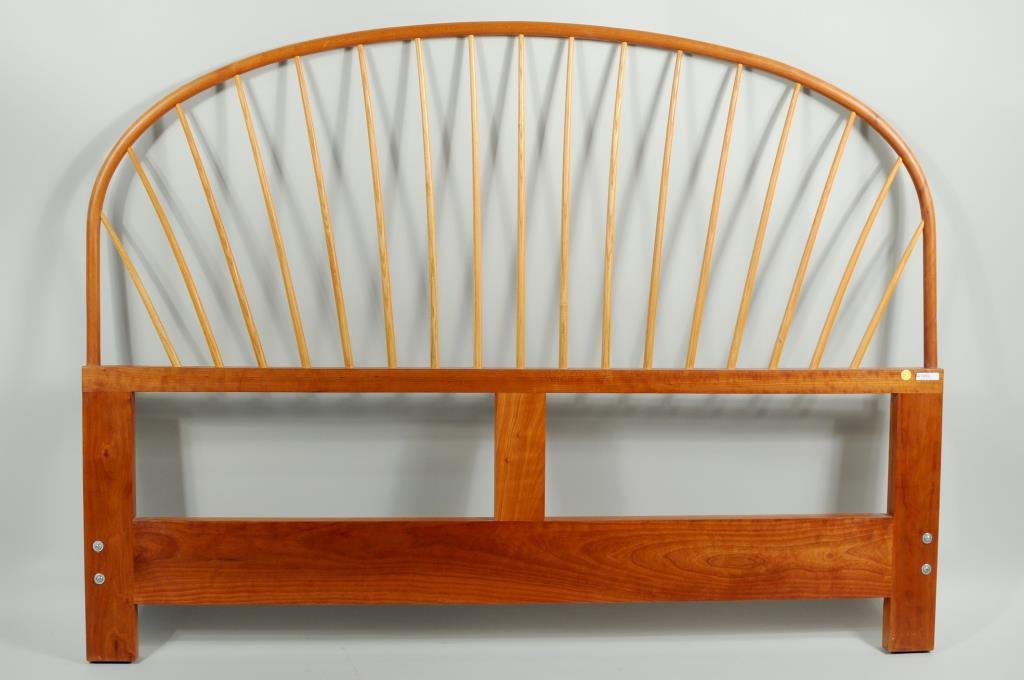 Thomas Moser Mixed Woods Windsor Queen Headboard: Thomas Moser mixed woods Windsor style queen headboard signed on underside "Thos Moser Cabinetmakers Auburn, Maine 1987 Jeannie Crane". 45 1/4" high, 61" wide.