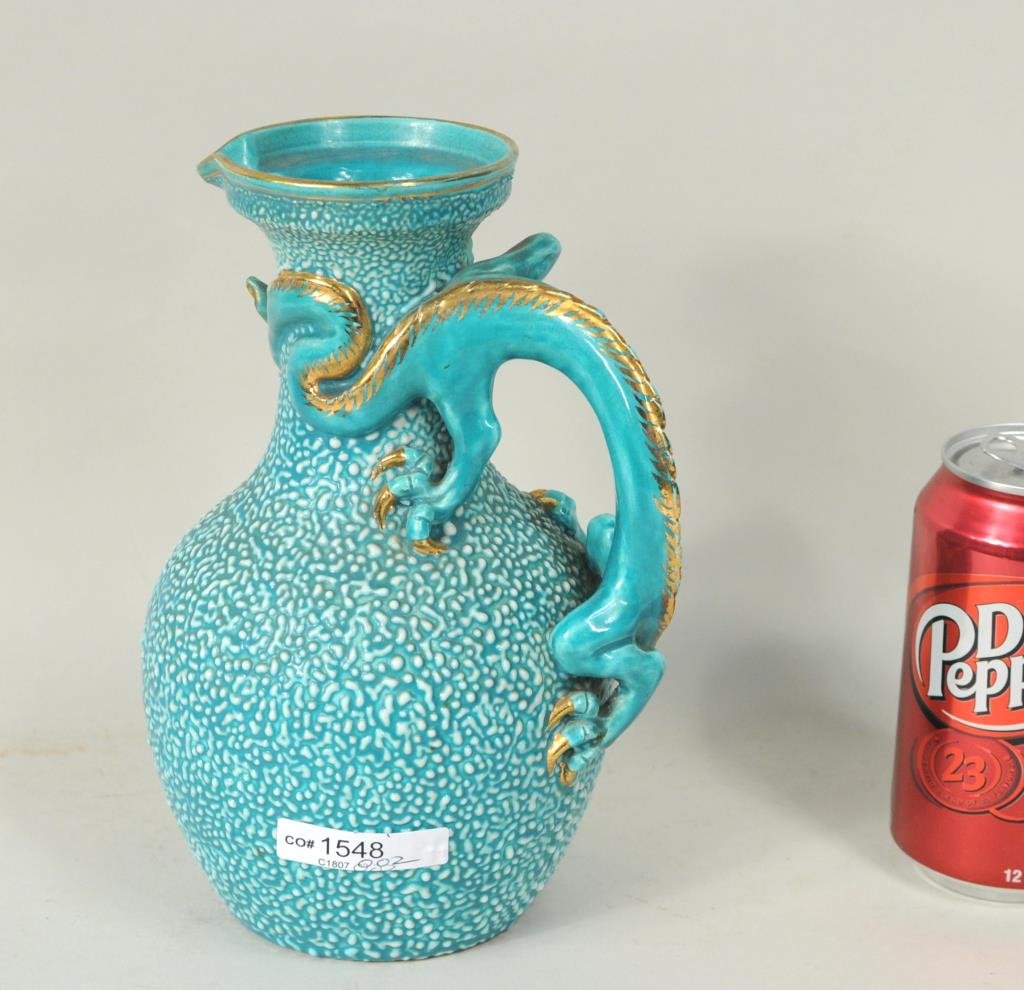 Zsolnay Hungarian Porcelain Dragon Ewer: Zsolnay Hungarian porcelain dragon ewer impressed "pecs Zsolnay 1 787". 8 1/2" high, 6" wide. Condition: gilt wear to rim.