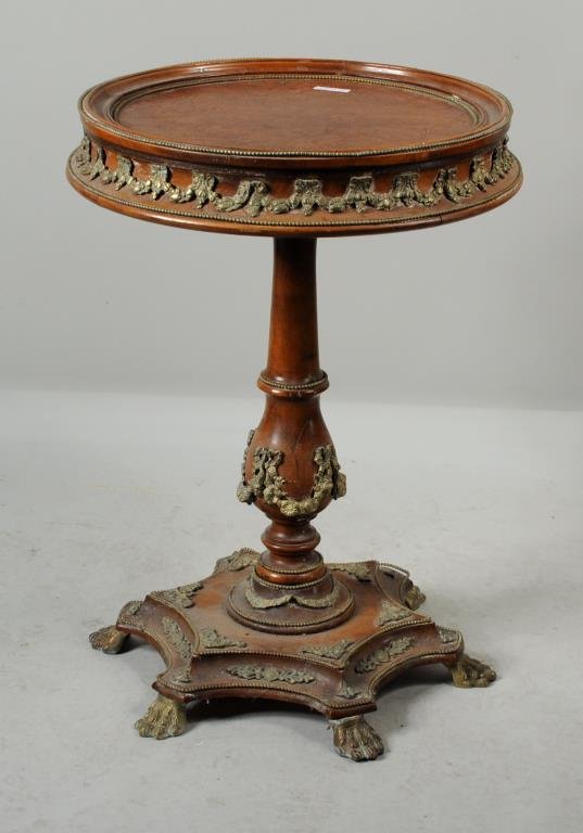 Continental Brass Mounted Gueridon: Continental brass mounted gueridon having circular top and baluster support in a hexagonal paw foot base. 28" high, 19" diameter top.
