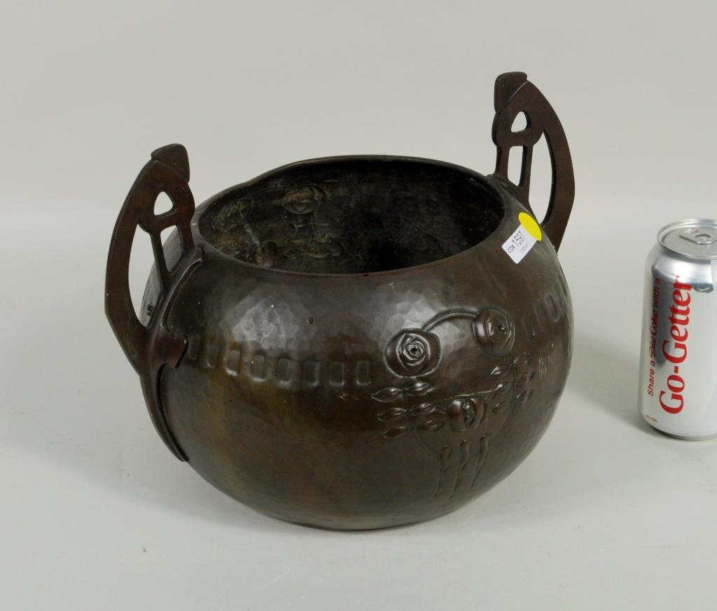 German WMF Co. Art Nouveau Copper Handled Bowl: German WMF Co. art nouveau copper handled bowl stamped on base. 8 3/4" high, 12" wide. Condition: dents, dings, lacking one interior handle screw.