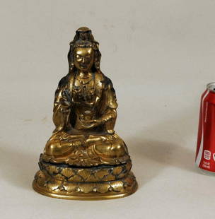 Asian Gilt Bronze Guanyin: Asian gilt bronze Guanyin in elaborate dress on separate foliate base. 8 1/2" high, 6" wide. Condition: gilt, patina wear, loss, oxidation , a few small light scratches, polish residue, small dings to