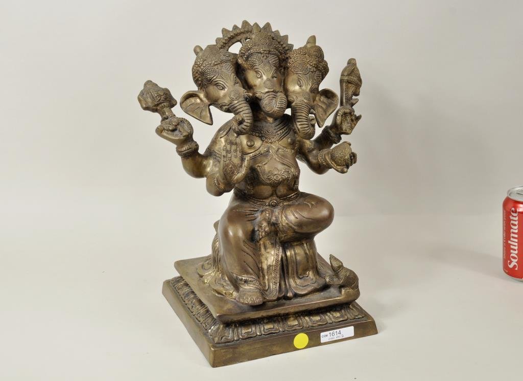 Large Bronze/Copper Figure Of Ganesha On Throne: Large bronze/copper figure of Ganesha on throne. 14" high, 11" wide.