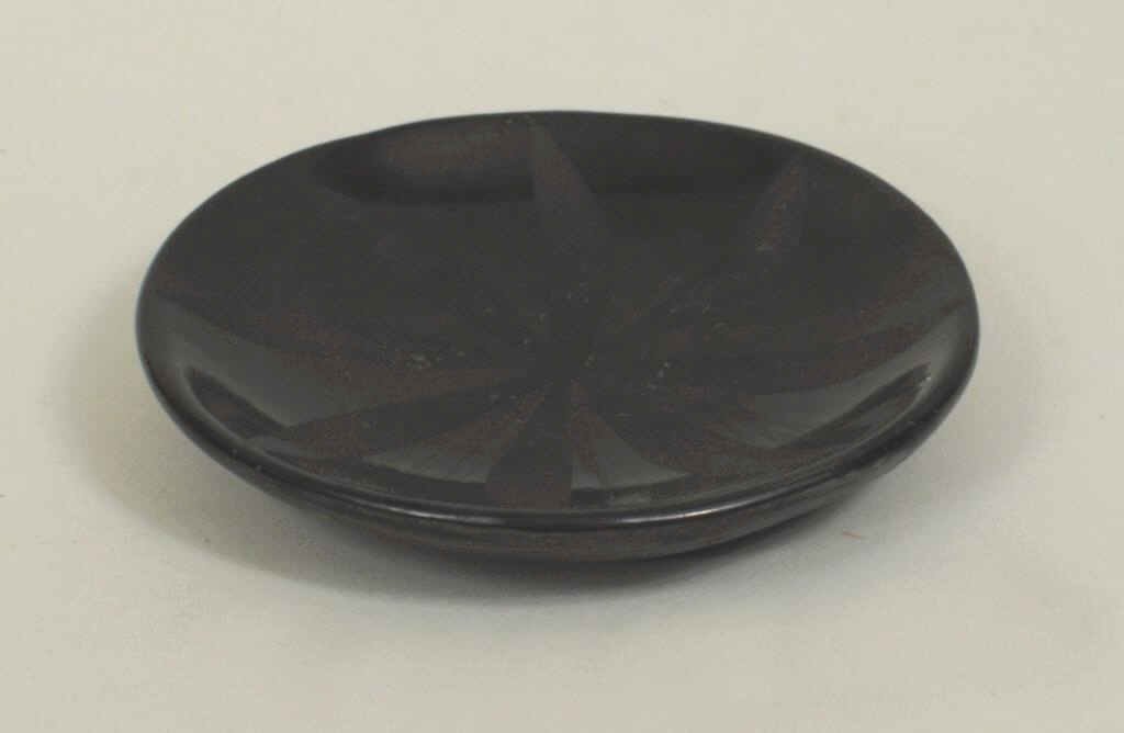 Maria Martinez and Santana San Ildefonso Plate: Maria Martinez and Santana San Ildefonso black on black pottery plate signed "Marie" and "Santana". 5 3/4" diameter. Condition: light surface scratches, a couple small losses.
