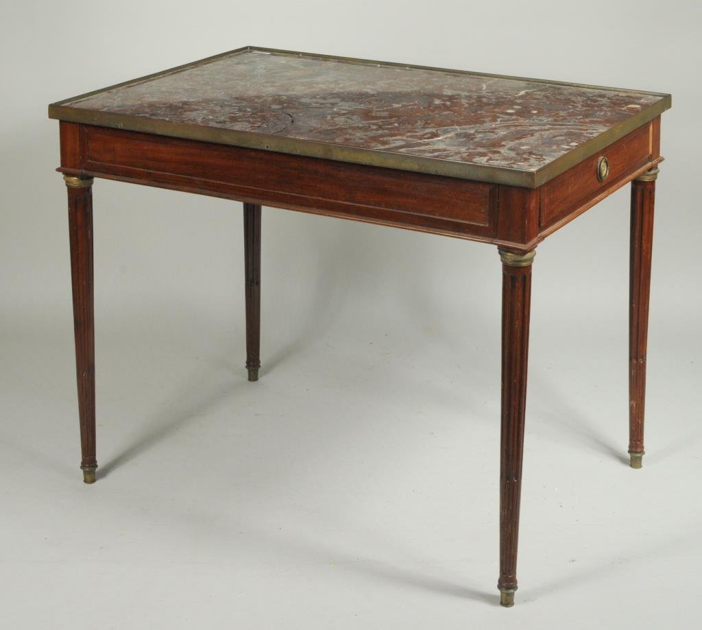 Louis XVI Marble Top Bronze Mounted Parlor Table: French Louis XVI marble top bronze mounted rectangular parlor table with red and white variegated marble, with one working drawer, raised on stop-fluted legs with brass toe caps, late 18th century. 28