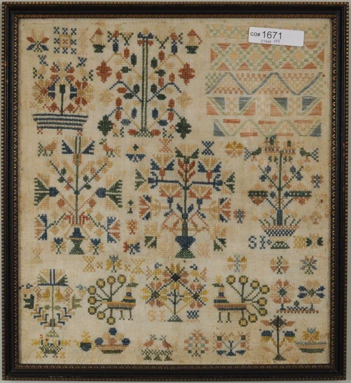 Needlework Sampler: Needlework sampler depicting flowers, urns and birds, initialed "SI". Framed, not examined out of frame. Sight size: 11" high, 10" wide. Frame size: 12" high, 11" wide. Condition: stains, toning.