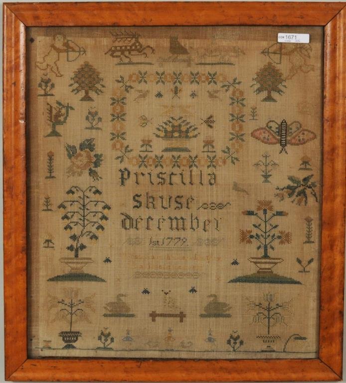 Large 1779 Needlework Pictorial Sampler: Large 1779 needlework pictorial sampler depicting angels, a stag, butterfly, floral urns signed, dated "Priscilla Skuse December 1779". Framed, not examined out of frame. Sight size: 18 1/2" high, 16
