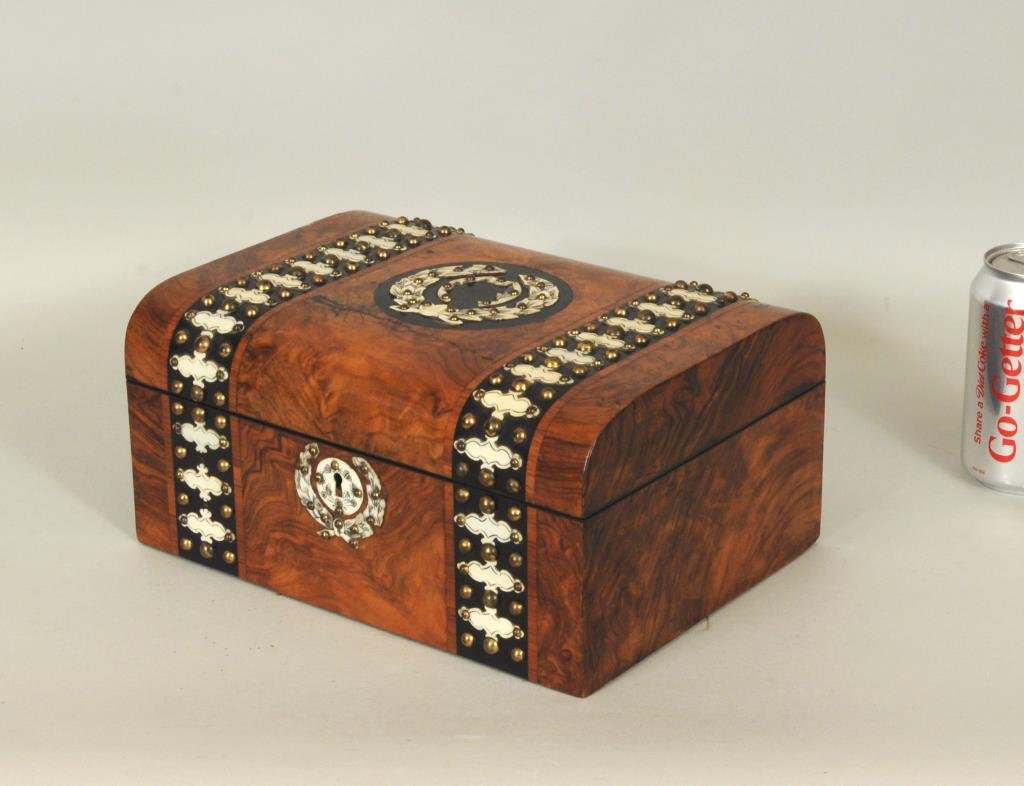 Victorian Burlwood Sewing Chest: Victorian Burlwood sewing chest with bone and mother of pearl inlay, interior with mother of pearl fittings and implements. 5 1/4" high, 11" wide. Condition: age cracks, soiling, stains, tears, losses