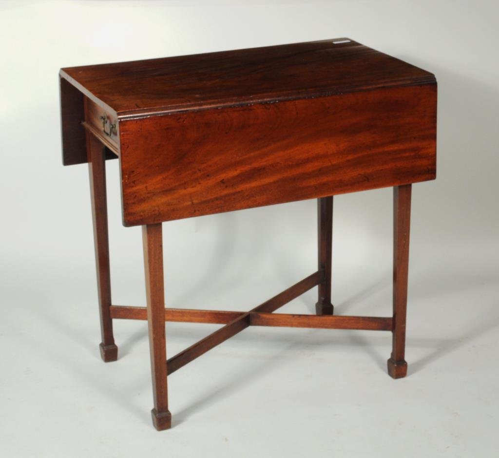 American Chippendale Mahogany Pembroke Table: American Chippendale mahogany drop leaf Pembroke table, rectangular leaves, one working drawer, supported on four tapering square legs ending in spade feet, connected by "X" stretcher. 29” high, 29�