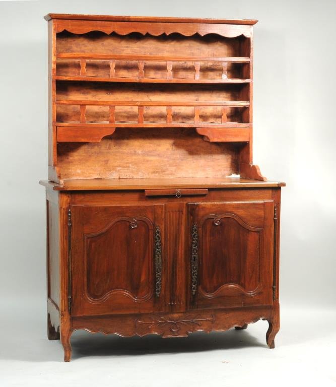 French Provincial Louis XV Fruitwood Vaisselier: French Provincial Louis XV fruitwood vaisselier, the associated upper section with shelves over a buffet with molded panel doors and fluted detail. 58" high, 55" wide, 24" deep. Condition: wear and re