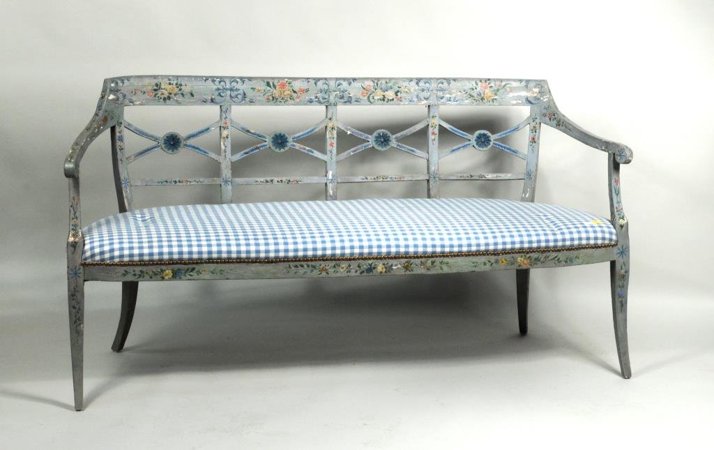 Continental Painted Four Chair Back Bench: Continental painted four chair back bench, painted with floral motifs on sabre legs, probably Italian, 19th century. 34" high, 66" wide, 19" deep. Condition: losses to painted decoration, modern uphol
