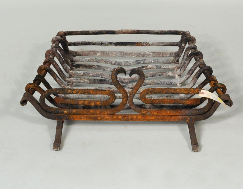 Early Wrought Iron Swan Decorated Fireplace Grate: Early wrought iron swan decorated fireplace grate. 10" high, 28" wide, 24 1/2" deep. Condition: use wear, rust, bends.