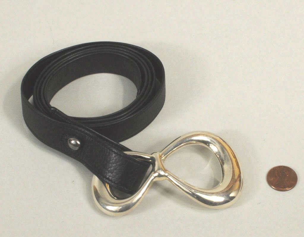 Tiffany & Co. Elsa Peretti Sterling Silver Belt: Tiffany & Co. Elsa Peretti sterling silver belt. Buckle: 2 1/8" high, 3 5/8" wide. Strap: 45 1/4" long, 7/8" wide. Weight: 1.115 OZT.