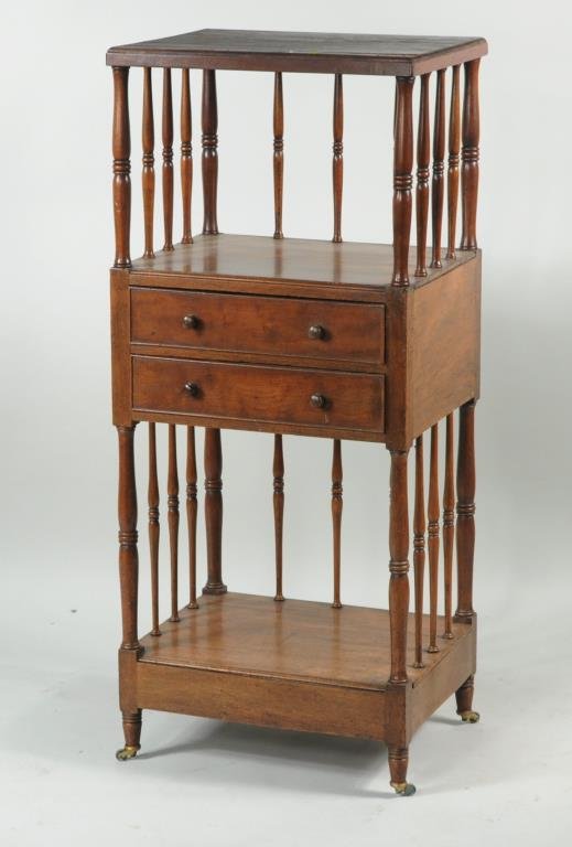 George III Mahogany Bibliotheque: George III mahogany bibliotheque, with two open compartments supported by ring turned spindles centering two stacked drawers. 44" high, 19" wide, 15" deep. Condition: some splitting to top and middle 