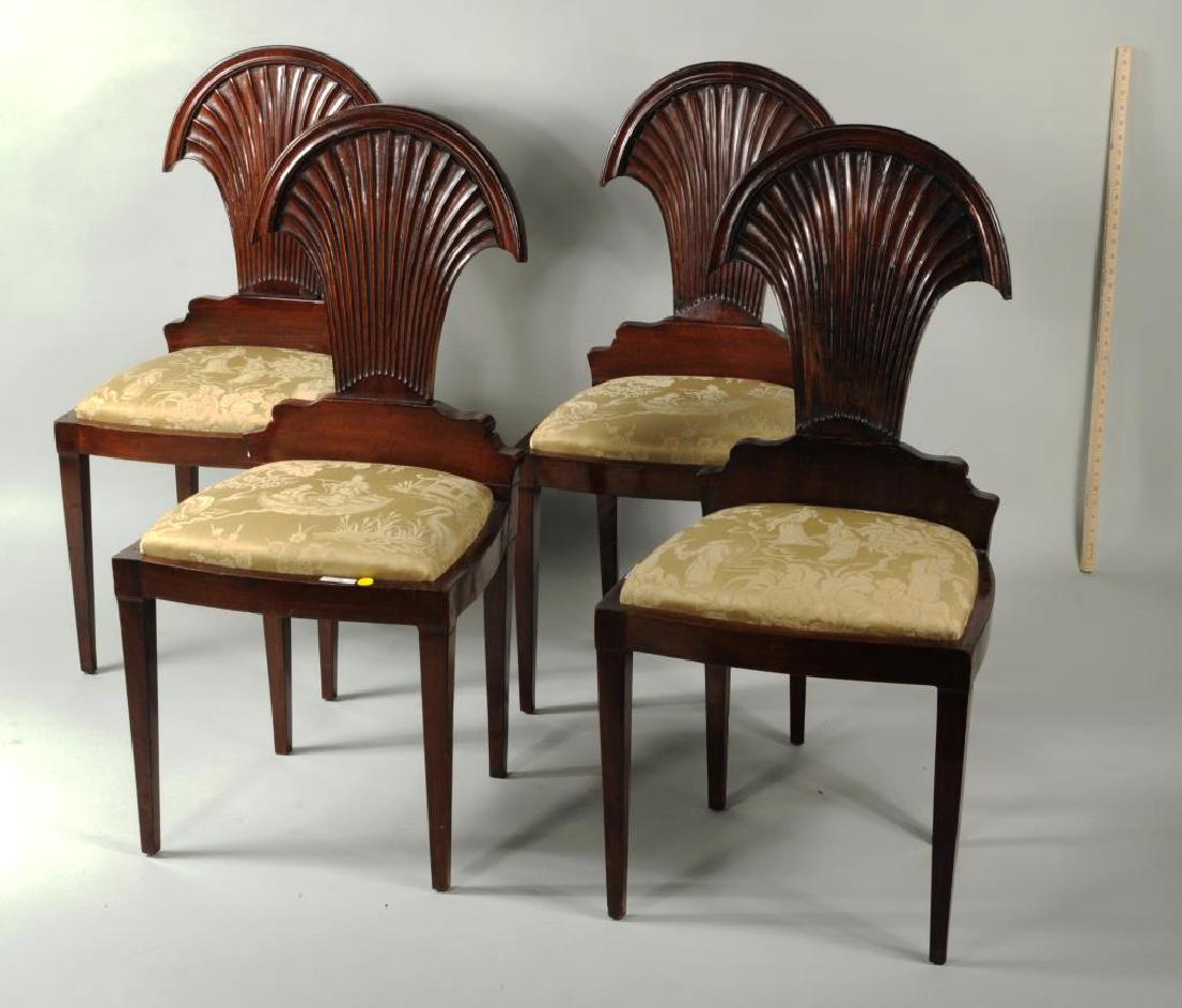 Toscanini's Four Carved Mahogany Hall Chairs: Toscanini's four carved mahogany hall chairs, each with flaring fluted back on square tapering legs. 36 1/2" high, 17 1/2" wide, 16 1/2" deep. Provenance: from the estate of Arturo Toscanini, purchase