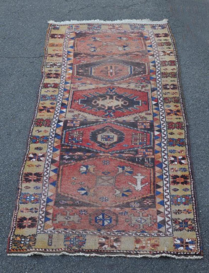 Tribal Runner: Tribal Runner. Pile wear, loss, end losses. 9' 1" long, 4' 1 1/2" wide. All rugs sold as is.