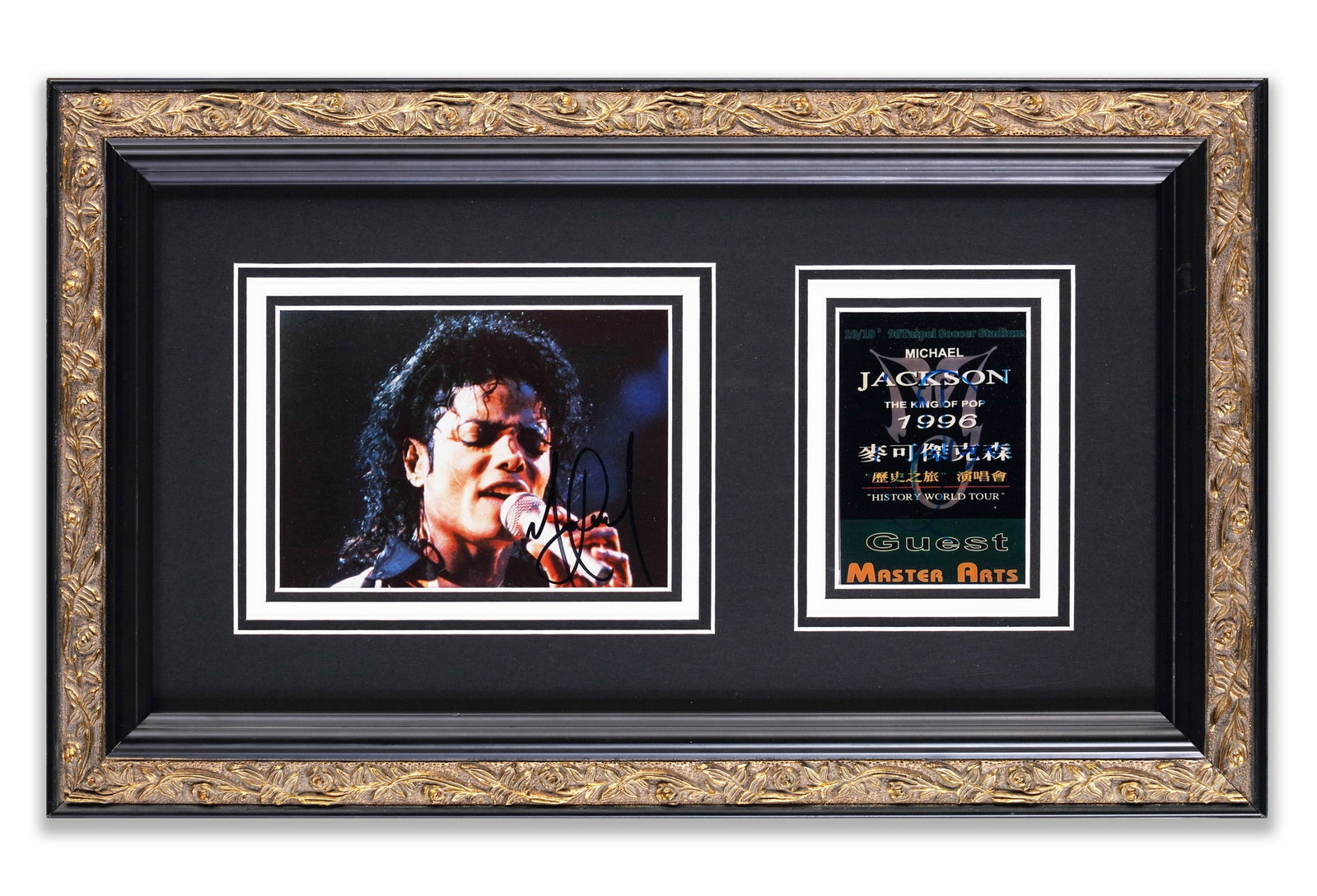 SIGNED PHOTO OF MICHAEL JACKSON AND GUEST CREDENTIALS: SIGNED PHOTO OF MICHAEL JACKSON AND GUEST CREDENTIALS Description:This is a highly collectible and culturally significant Michael Jackson signed souvenir, from the "Journey through History" concert in
