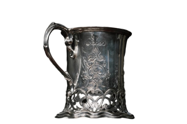 BRITISH VINTAGE SILVER MUG: BRITISH VINTAGE SILVER MUG Description: This vintage British silver mug comes with all the necessary markings, including a lion stamp, a London Silver Appraisal Bureau stamp, a date stamp correspondin